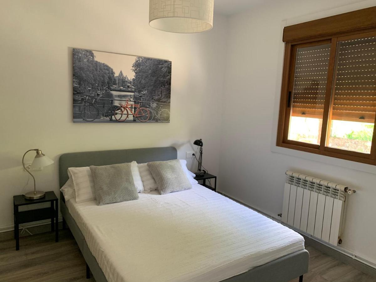 A Casa Vermella Con Jardin A 10 Minutos De Santiago De Compostela Appartement Ortono Buitenkant foto